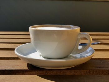 Close-up of coffee cup on table