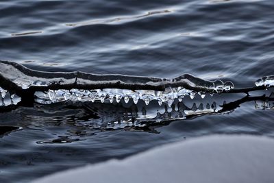 Scenic view of sea against sky during winter
