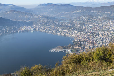 High angle view of townscape against mountains