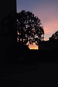 Built structure against sky at sunset