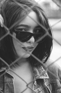 Close-up portrait of woman with sunglasses