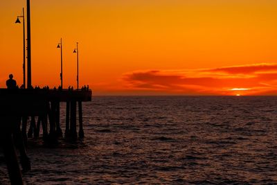 Scenic view of venice pier with orange sunset