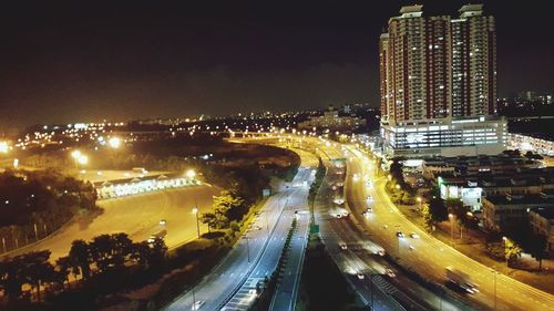 Illuminated cityscape at night