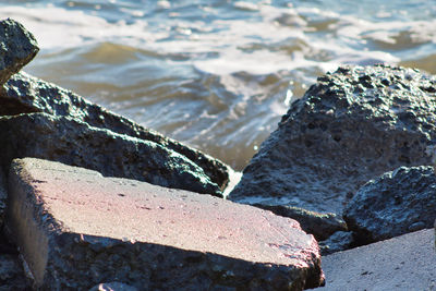 Close-up of rocks on shore