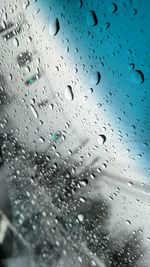 Close-up of water drops on glass