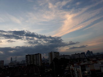 Cityscape against sky during sunset