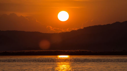 Scenic view of sunset over sea