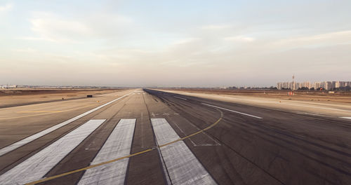 View of airport runway against sky