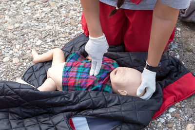 Midsection of girl with toy