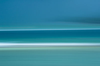 Scenic view of blue sea against sky