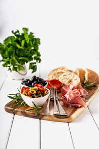 Food served on table against white background