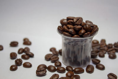 Close-up of coffee beans on table