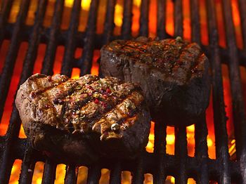 Close-up of meat on barbecue grill