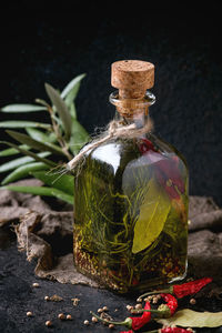 Close-up of glass jar on table