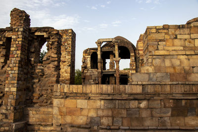 Low angle view of old ruin building against sky