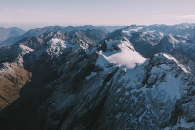 Aerial view of mountains against sky