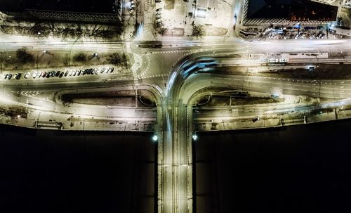 Reflection of illuminated car in mirror