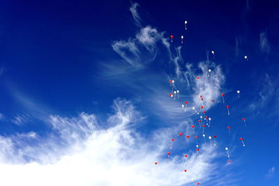 Low angle view of airshow in sky