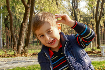 Little boy with a funny expression on his face