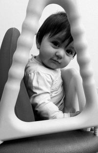 Close-up portrait of girl at home