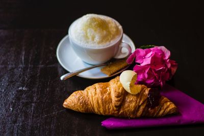 Close-up of coffee cup on table