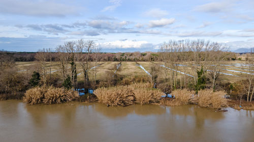 Scenic view of river against sky