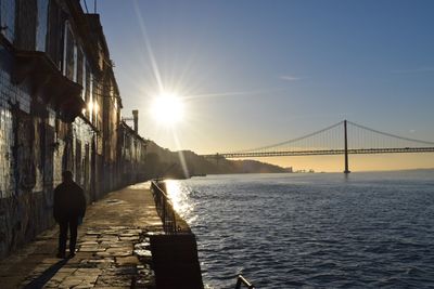 View of bridge over sea against clear sky