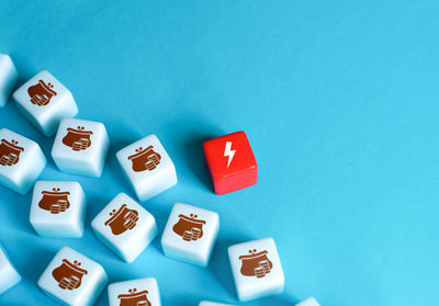 Close-up of dices on blue background