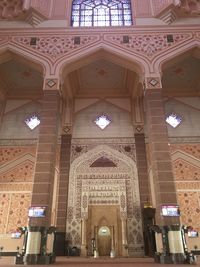 Low angle view of illuminated ceiling of building