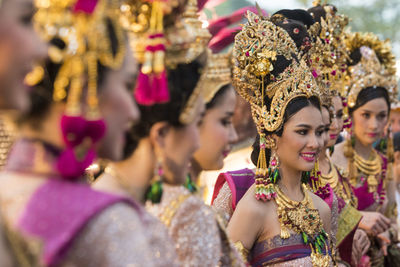 Group of people in traditional clothing during festival