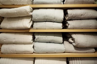 Full frame shot of towels in shelves