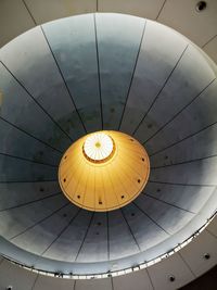 Low angle view of illuminated ceiling