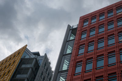 Low angle view of modern buildings against sky