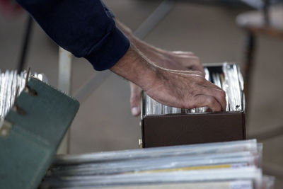 Close-up of hand holding book