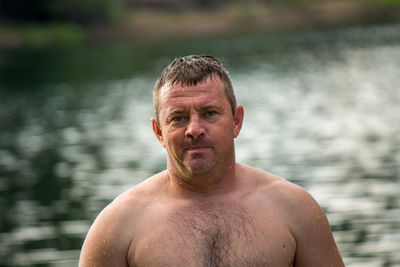 Portrait of shirtless man in water