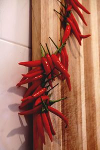 Close-up of red chili peppers on table