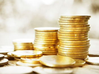 Close-up of coins on table