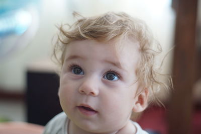 Close-up of cute baby at home