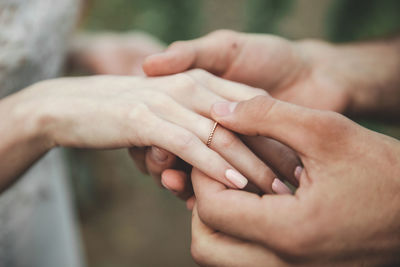 Close-up of couple hands