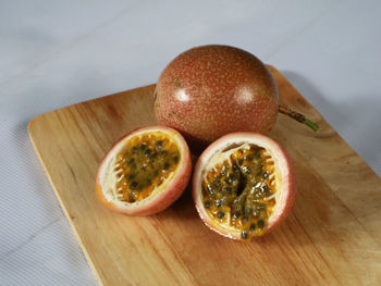 High angle view of fruits on cutting board