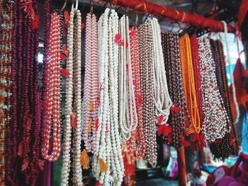 Various hanging for sale in market stall