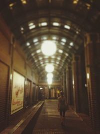 Full length of woman in tunnel