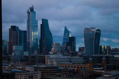 Modern buildings in city against sky