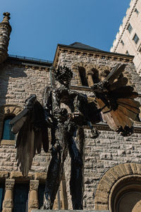 Low angle view of statue against clear sky