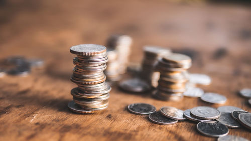 Close-up of coins on table