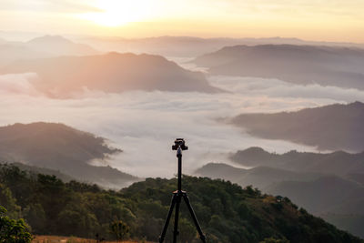 Scenic view of mountains against sky during sunset