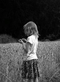 Full length of child standing on field
