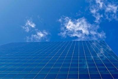 Low angle view of plants against blue sky