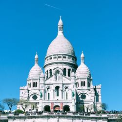 Basilica of the sacred heart of paris against clear blue sky