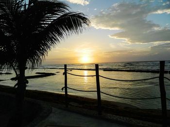 Scenic view of sea at sunset